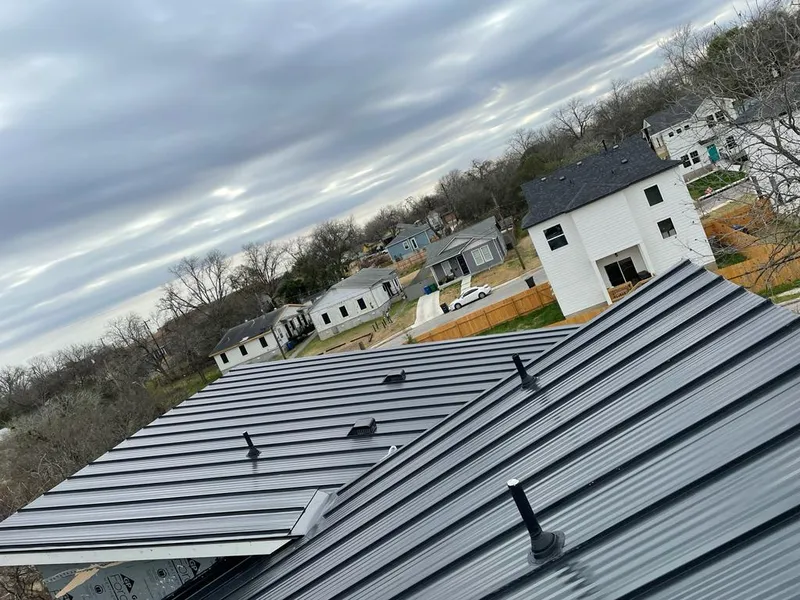 Standing seam metal roof panels with vents for Skylight Repair in Williamstown